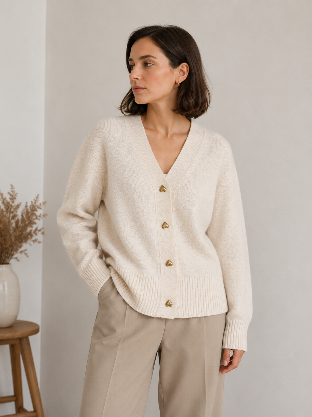 Women's fine-knit cardigan with V-neck and button closure, front view