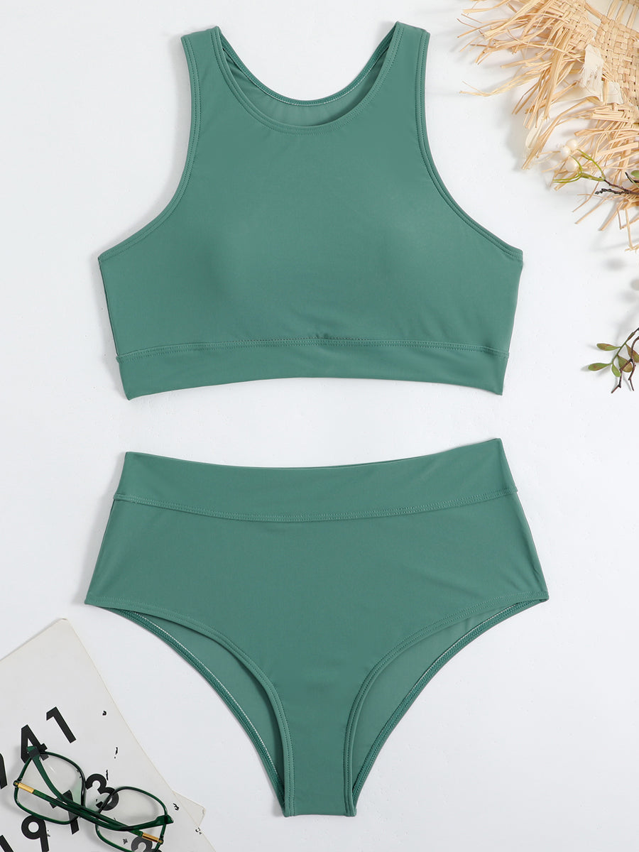 Deux pièces sport femme, haut col montant et bas taille haute, coupe près du corps