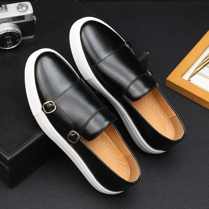 Men's low-profile slip-on shoes featuring double buckle straps, paneled construction, and a contrasting rubber sole