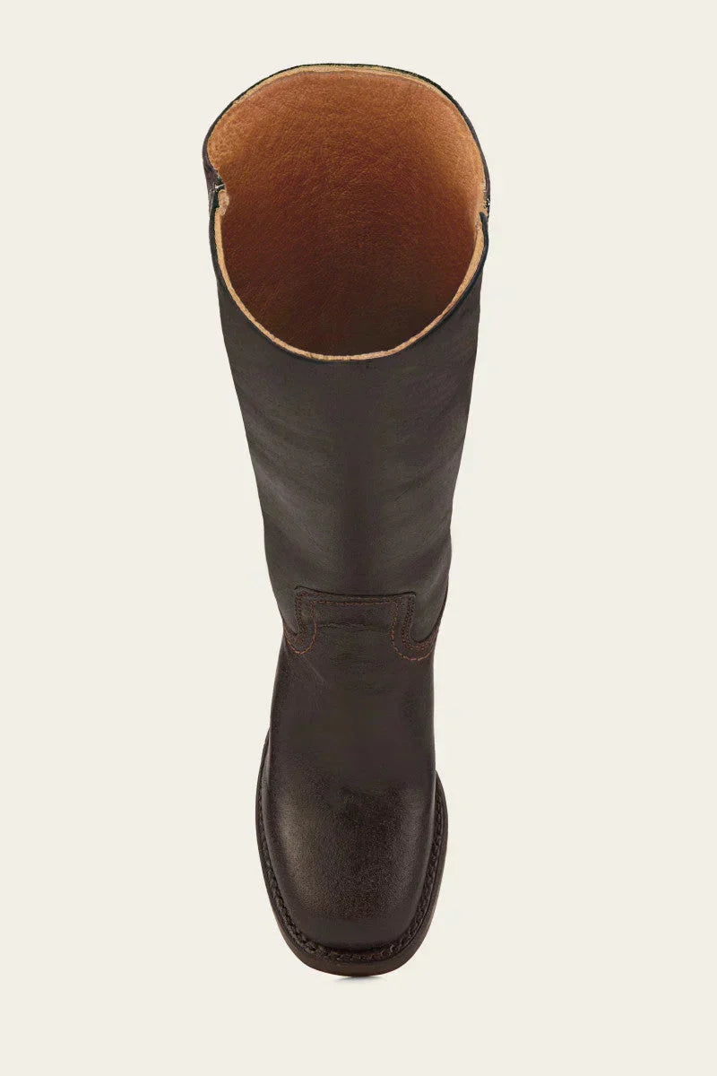 Women's mid-calf to knee-high boots worn standing, showing shaft structure
