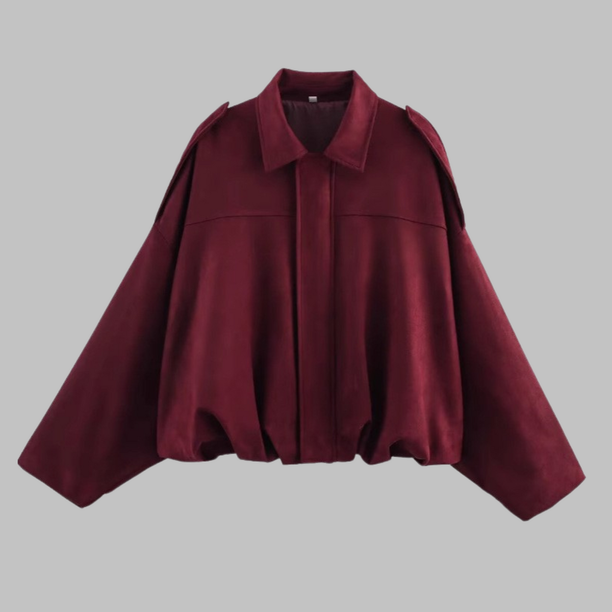 Cropped women's jacket with a minimalist design and voluminous sleeve detail