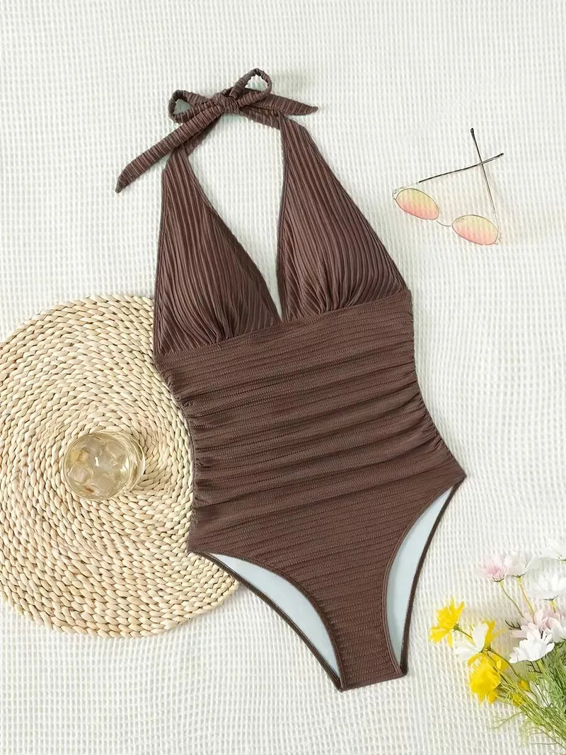 Maillot de bain une pièce côtelé à bretelles nouées au cou, silhouette gainante, femme