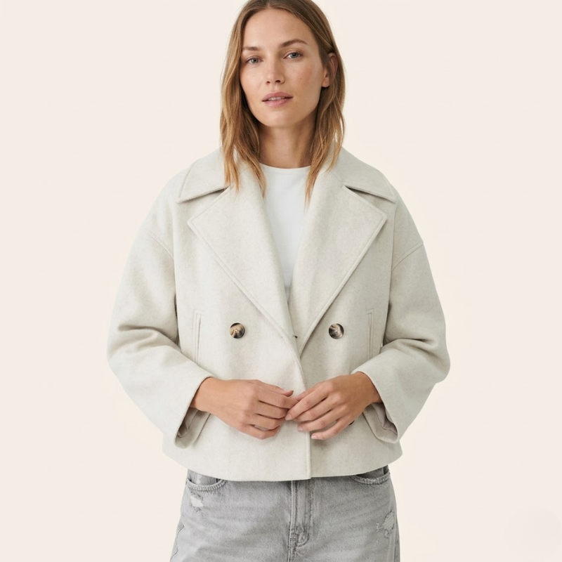 Manteau portefeuille à revers structurés, coupe courte et ajustée, usage féminin