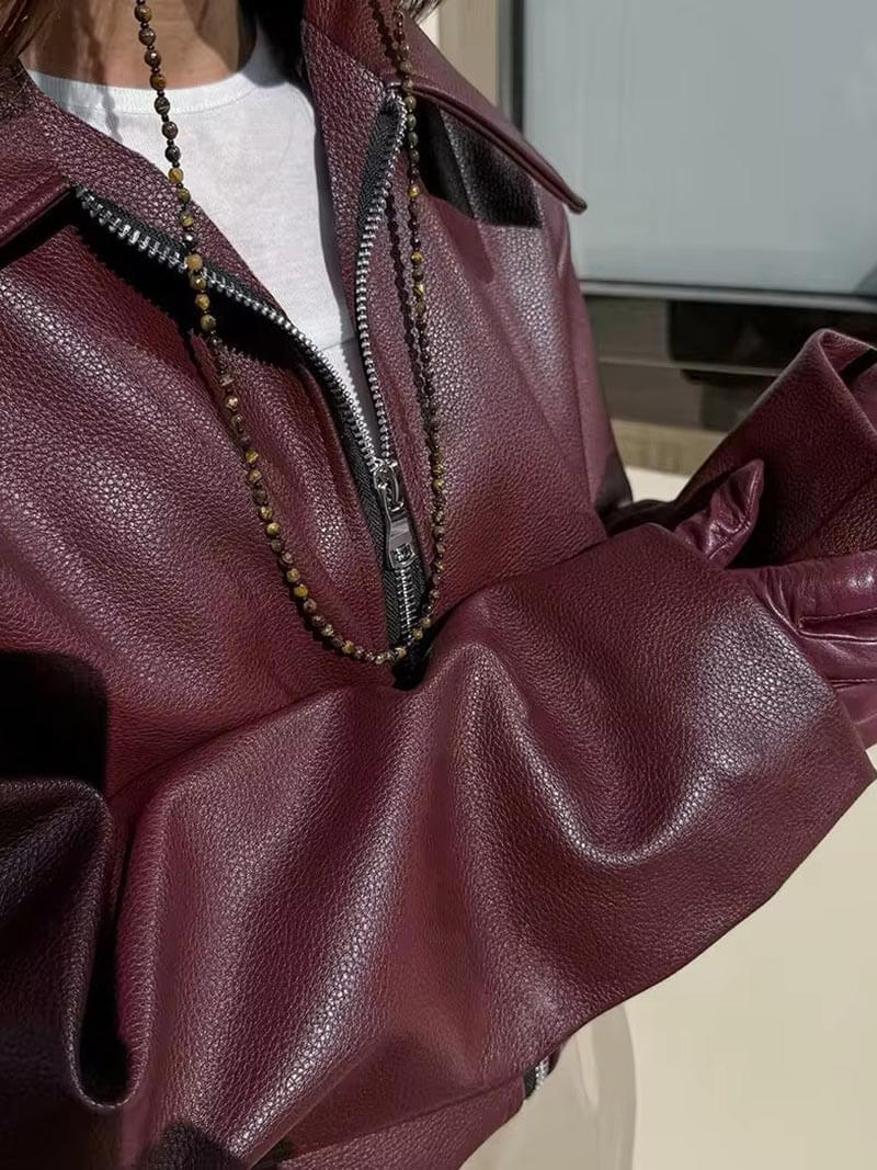 Veste structurée avec zip frontal et finition lisse