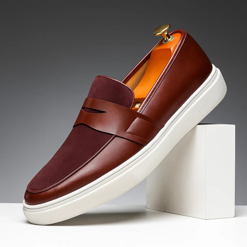 Men's slip-on penny loafers with a smooth synthetic leather upper and classic penny strap