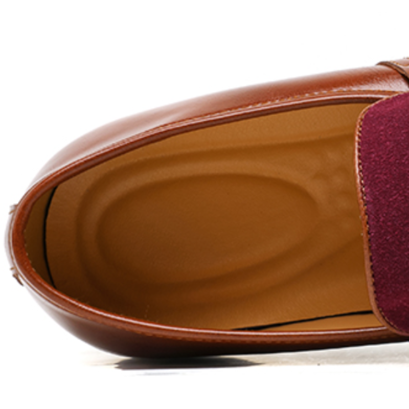 Close-up of the penny strap and smooth upper on men's slip-on loafers