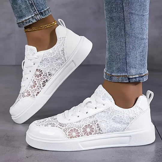 Women's sneakers featuring lacing closure and soft inner lining