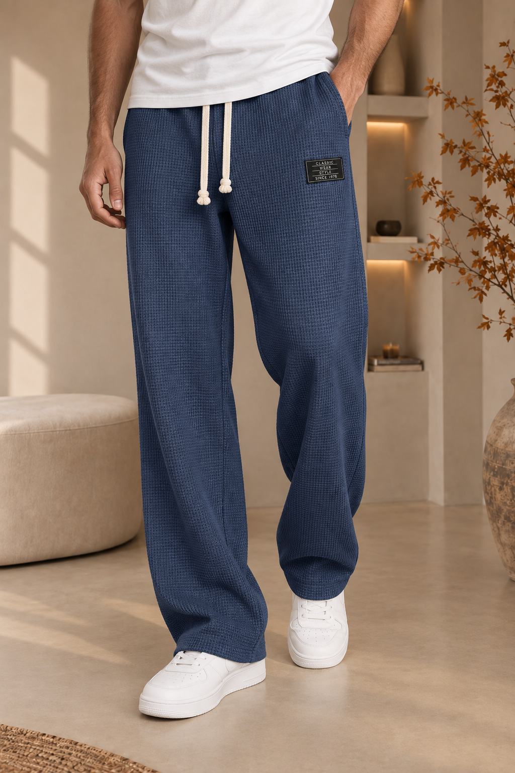 Relaxed men's waffle-texture knit pants with elastic waist, available in multiple sizes