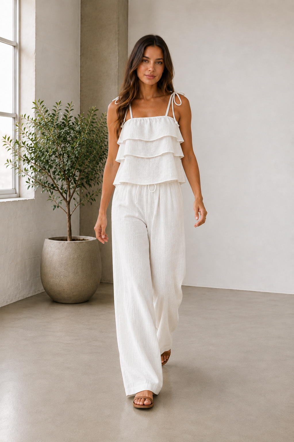 Women's white linen trouser set with full-length wide-leg trousers