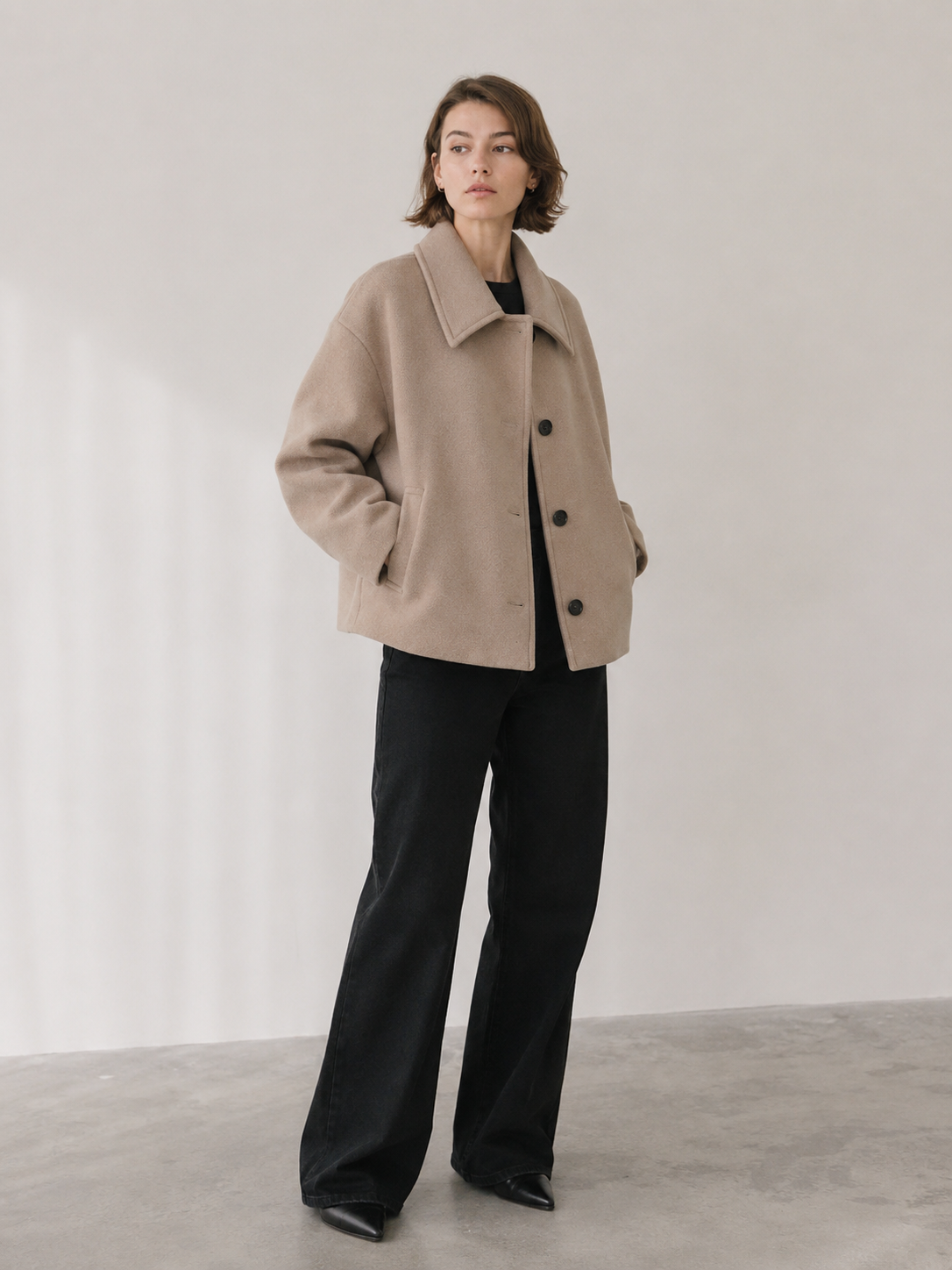 Women's oversized short wool-blend coat with lapel collar and button closure