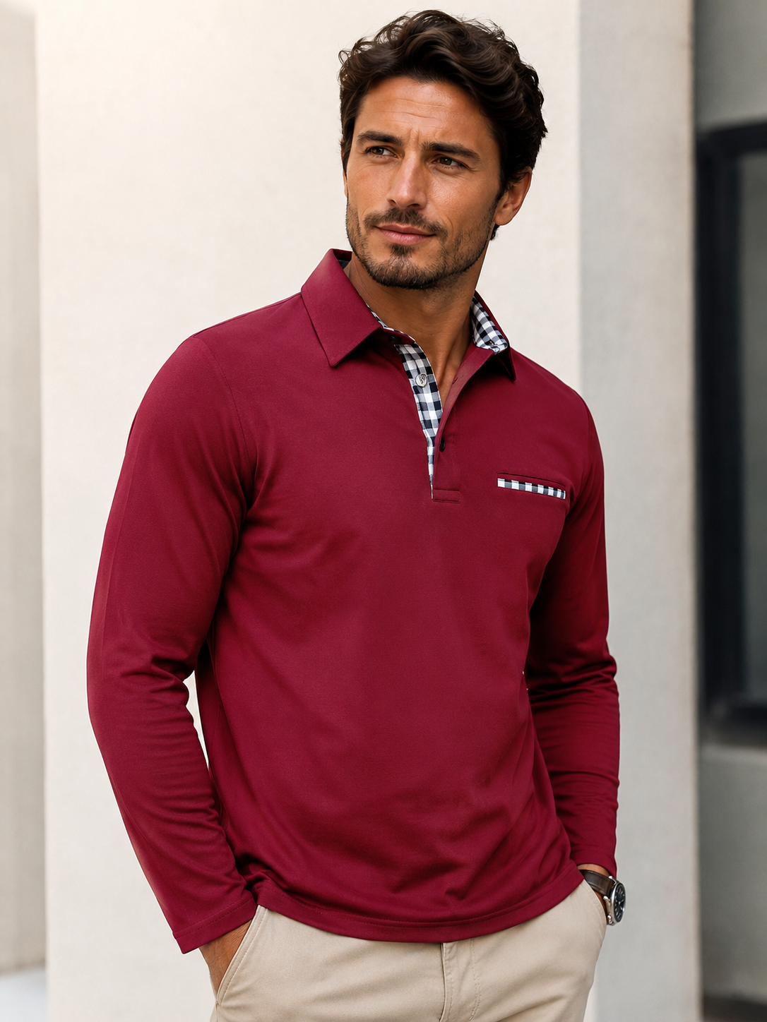 Men's long-sleeved polo shirt with checkered collar lining, button placket, and chest pocket