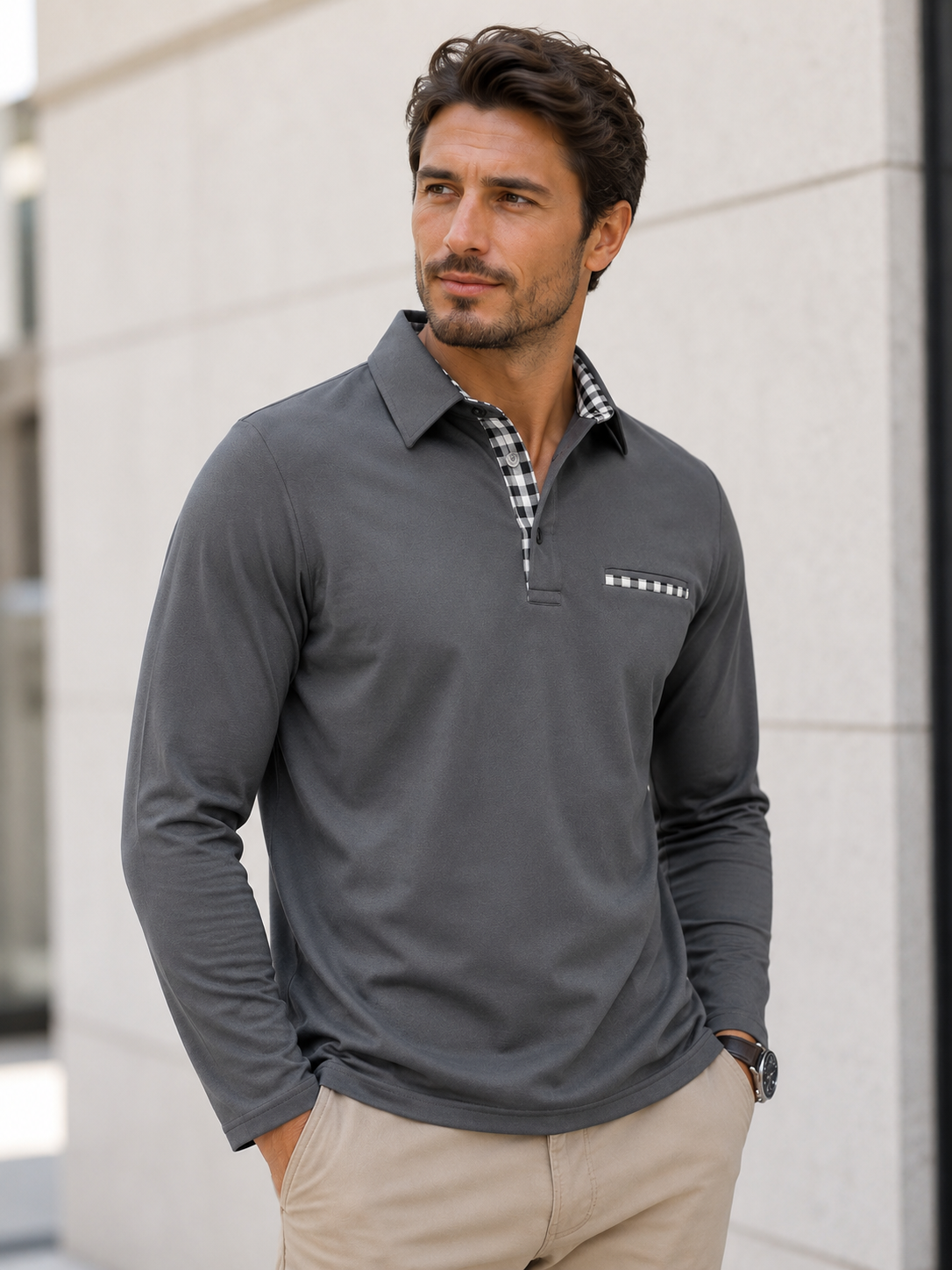 Long-sleeved men's polo shirt featuring a checkered collar, front button placket, and straight hem