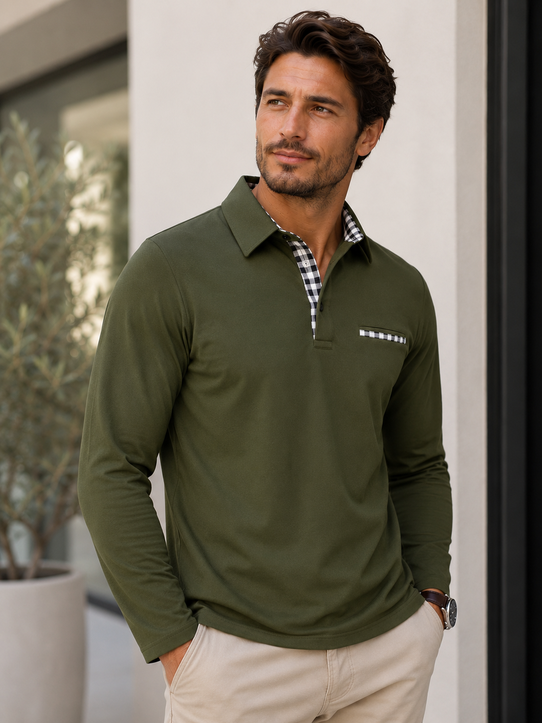 Men's regular-fit polo shirt with long sleeves, checkered collar detail, and chest pocket