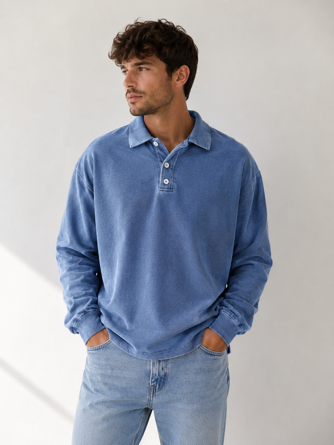 Men's long-sleeve polo sweatshirt with relaxed fit and button collar