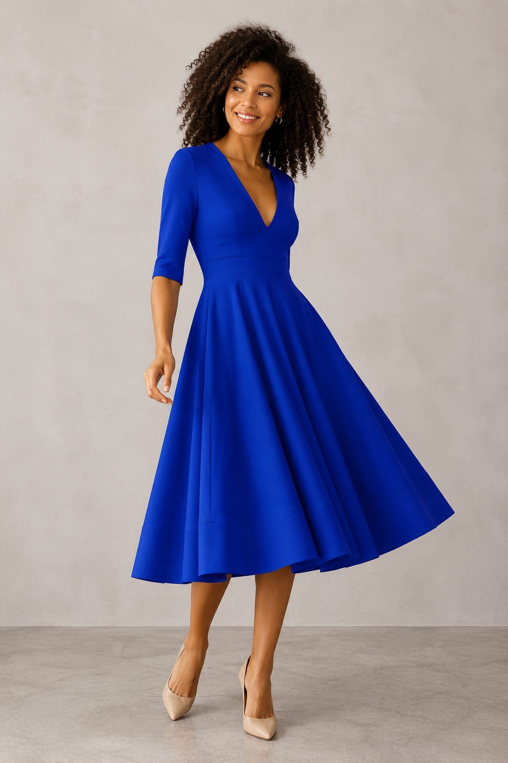 Women's flared midi dress with V-neck, three-quarter sleeves, and midi-length flared skirt