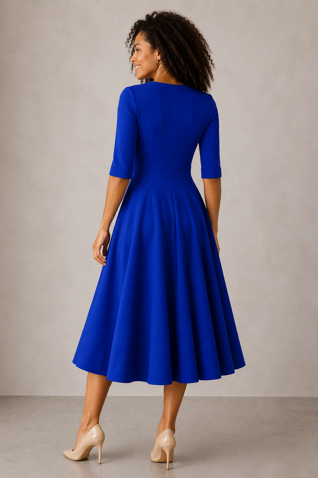 Women's flared midi dress with V-neck, three-quarter sleeves, and midi-length flared skirt