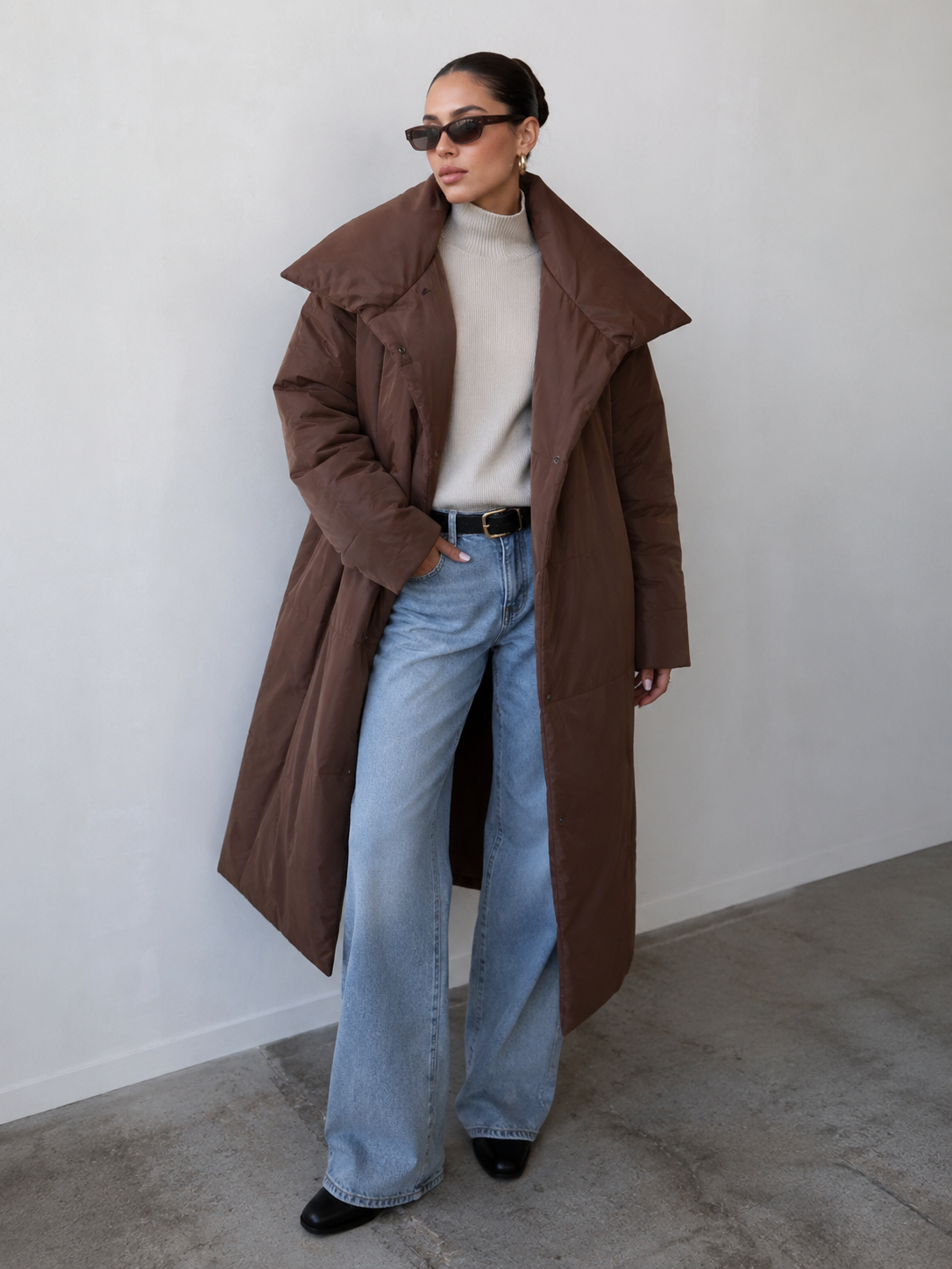Women's long padded coat with wide collar and front closure