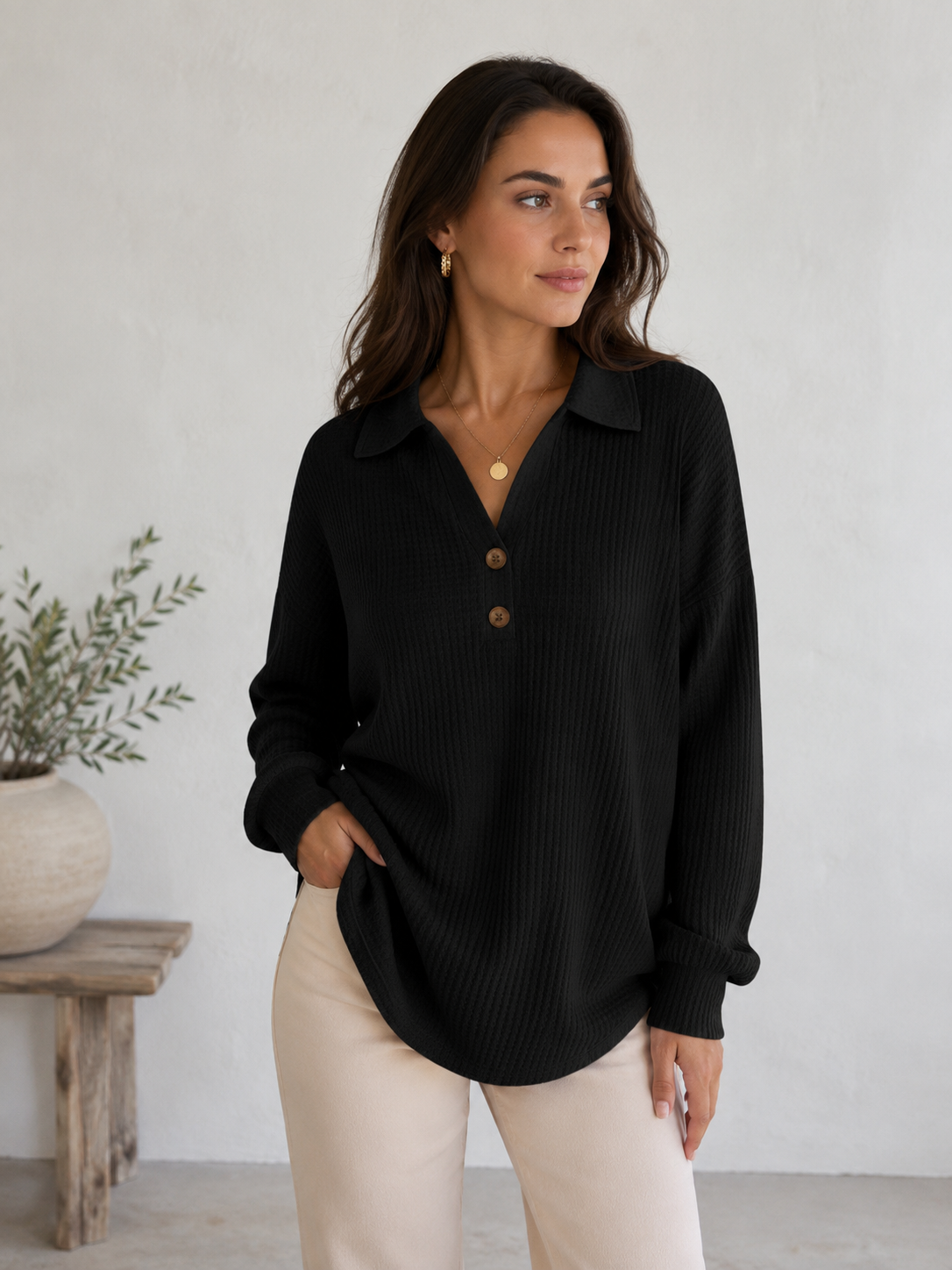 Women's long-sleeved textured blouse with relaxed silhouette and open collar