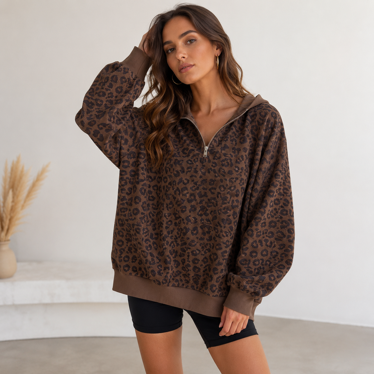 Women's ribbed knitted sweater with half-zip and all-over pattern in a relaxed silhouette