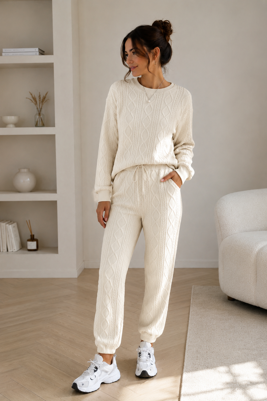 Relaxed-fit women's knitted lounge set with cable pattern, sweater and tapered trousers