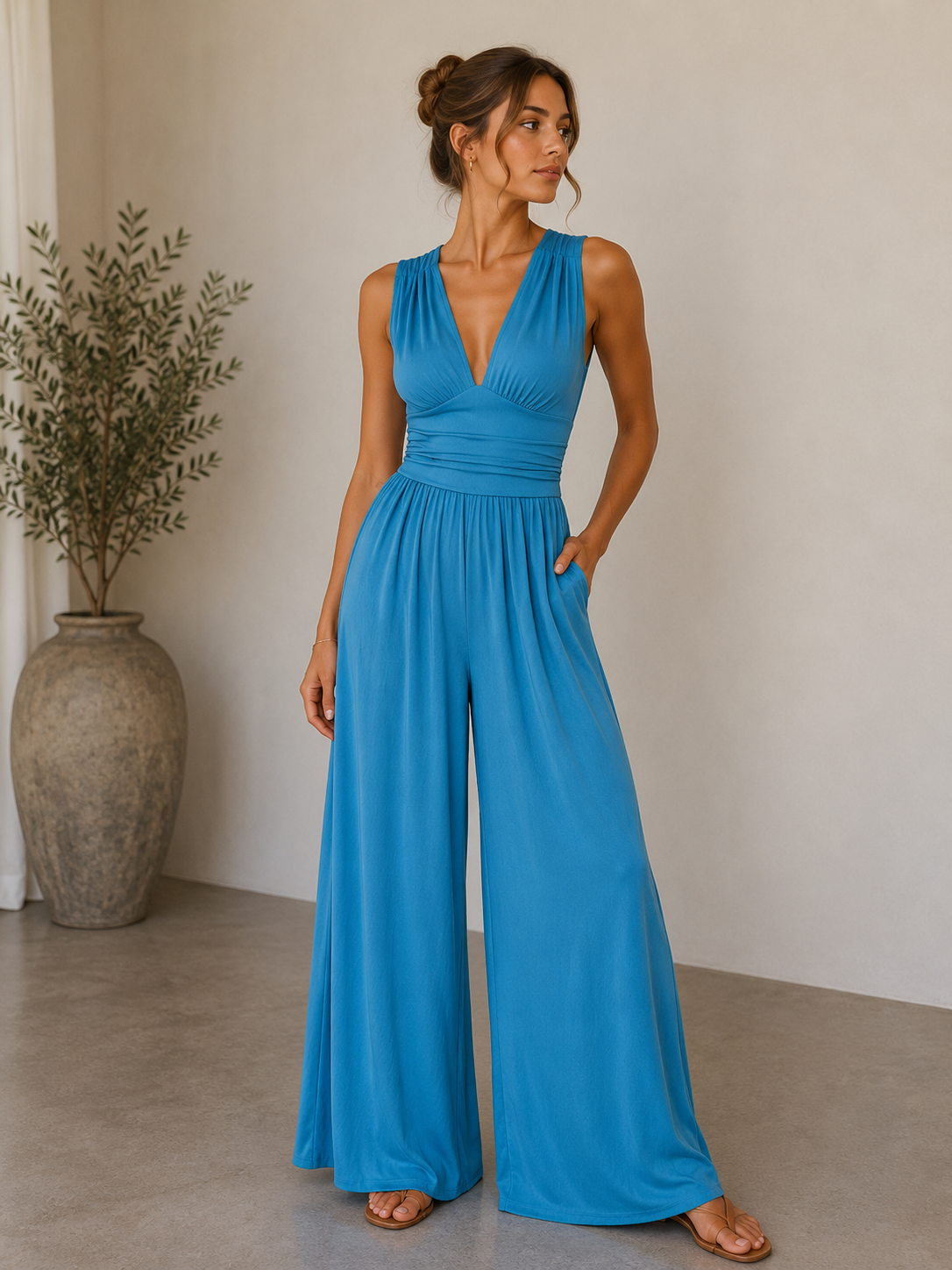 Women's Elegant Wide-Leg Jumpsuit with Sleeveless Cut and Deep V-Neck for Versatile Styling