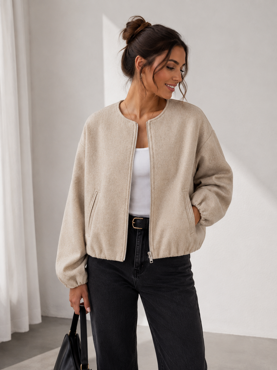 Women's zip jacket with voluminous long sleeves and round neckline