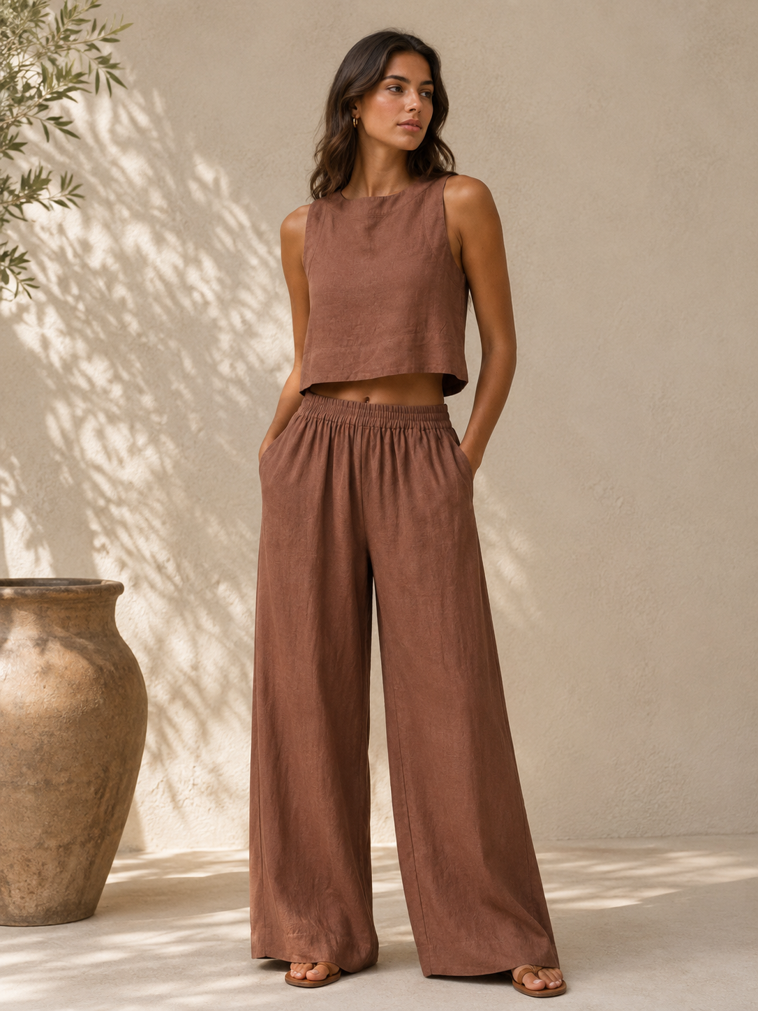 Sleeveless linen-blend two-piece set with cropped top and relaxed wide-leg trousers for women