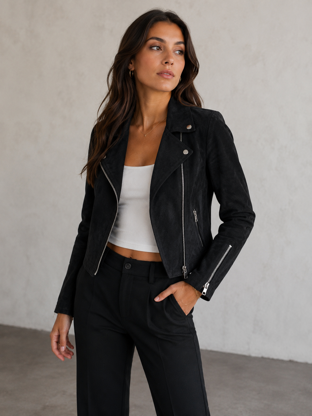Women's fitted faux suede biker jacket with asymmetrical front zipper and lapel collar