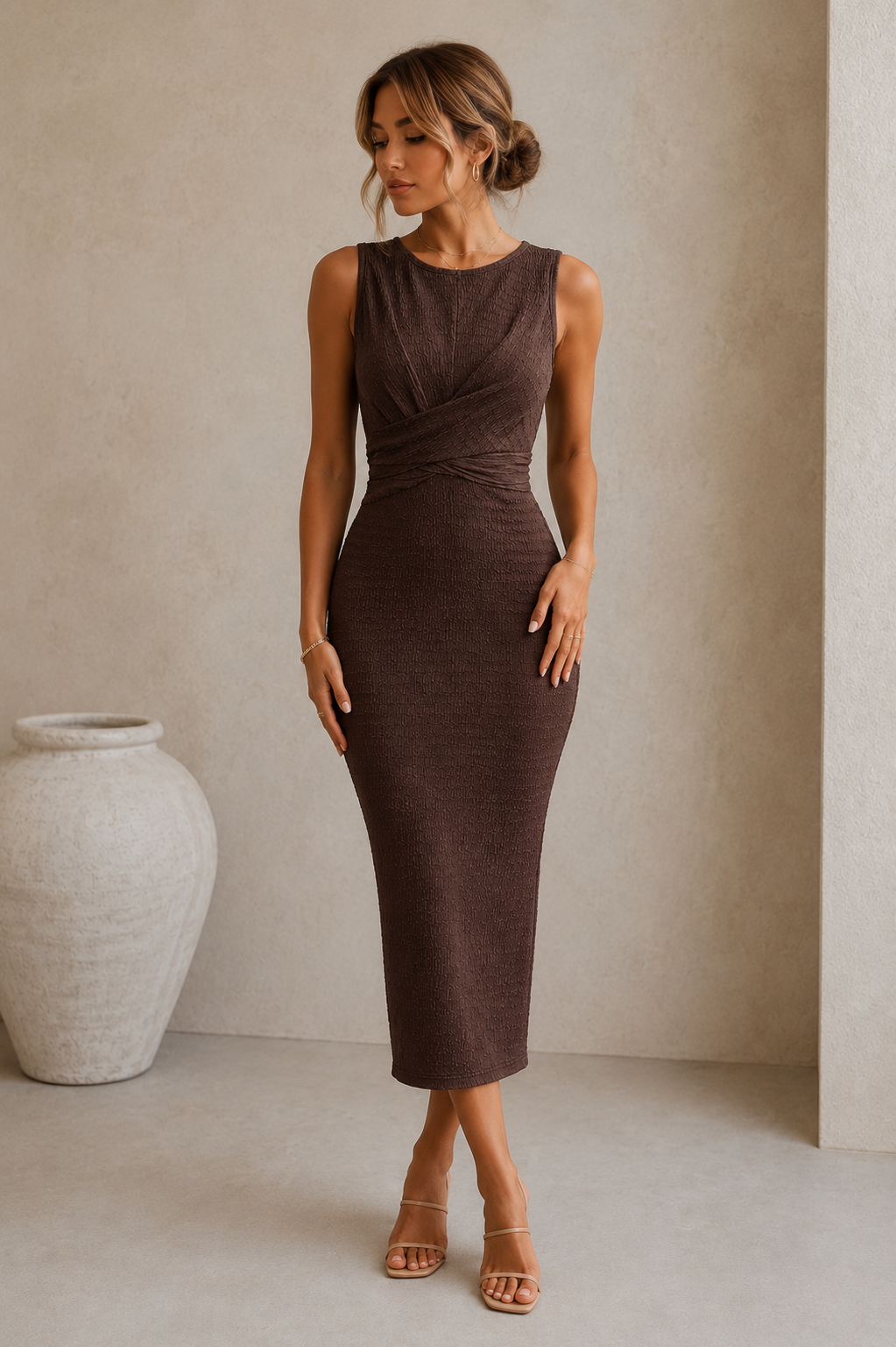 Sleeveless draped midi dress with round neckline and wrap waist detail