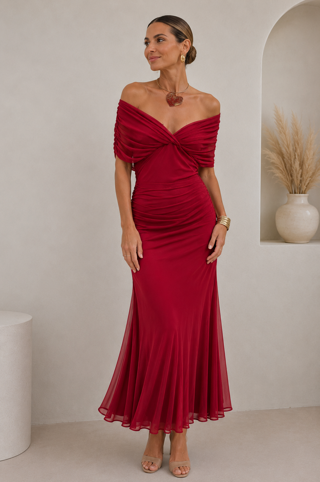Women's off-shoulder maxi dress with short sleeves and a flowing draped skirt