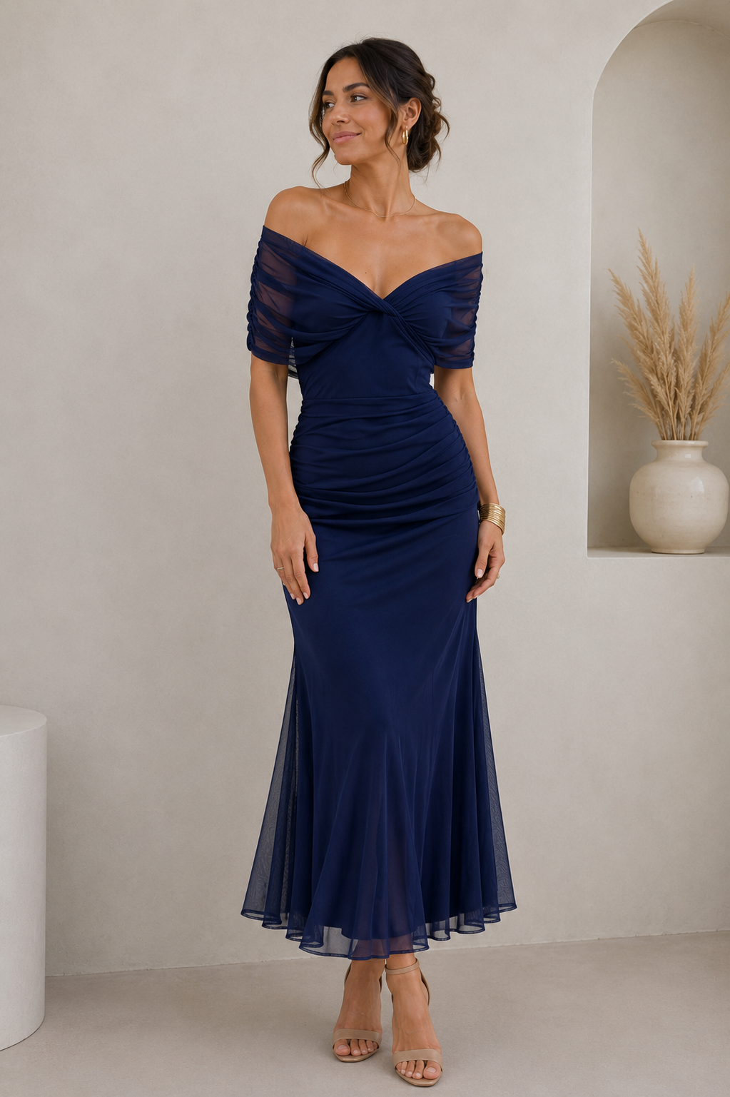 Off-shoulder maxi dress with twisted front construction and maxi-length flowing hem