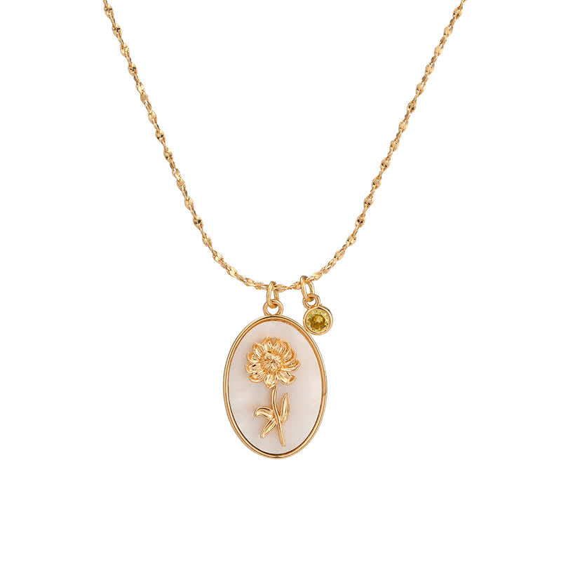 Collier à chaîne fine, pendentif ovale floral et petit élément rond suspendu