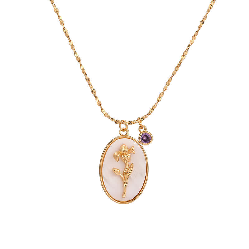 Pendentif ovale avec motif floral en relief sur chaîne fine, petit charm rond