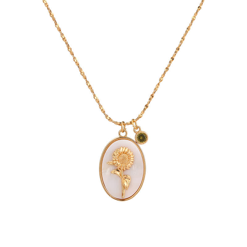 Collier léger à pendentif ovale orné d'un motif floral et d'un petit charm rond