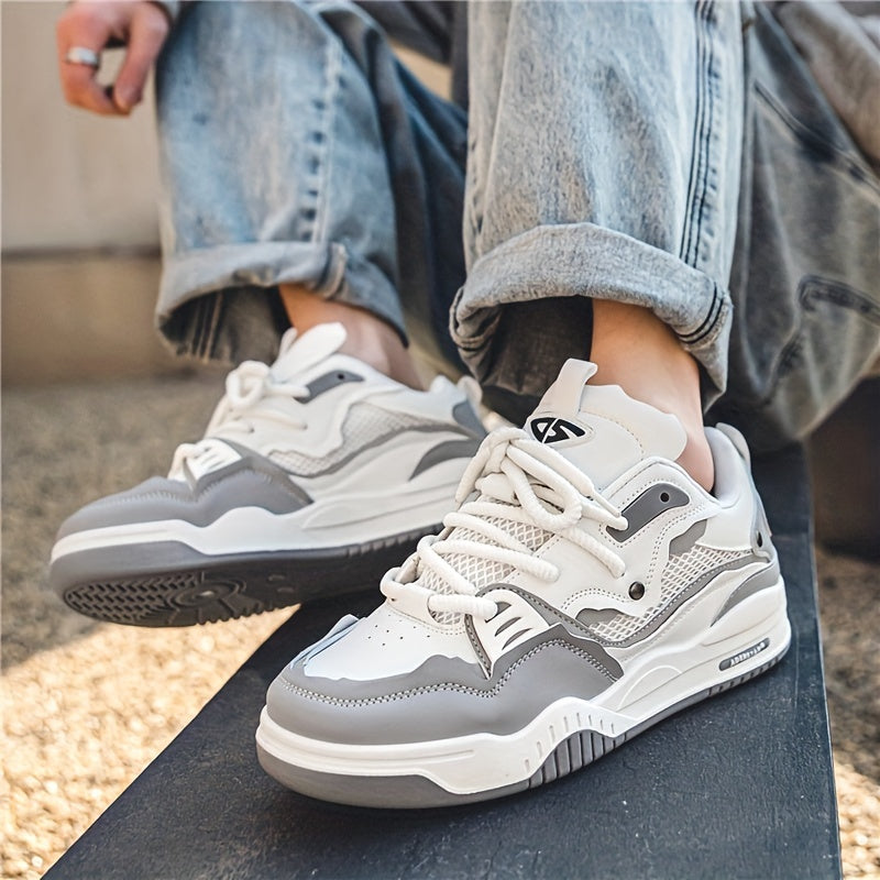 Basket chunky homme vue de profil, tige à empiècements contrastés et semelle épaisse