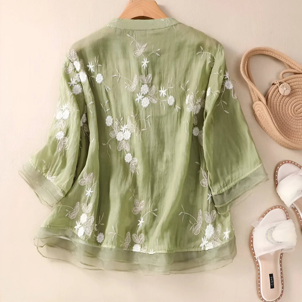 Blouse semi-transparente brodée, fermeture boutonnée devant, col officier, coupe fluide