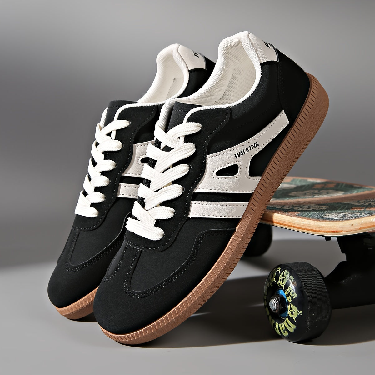 Women's casual sneakers with contrast paneling, padded heel, and flat synthetic sole