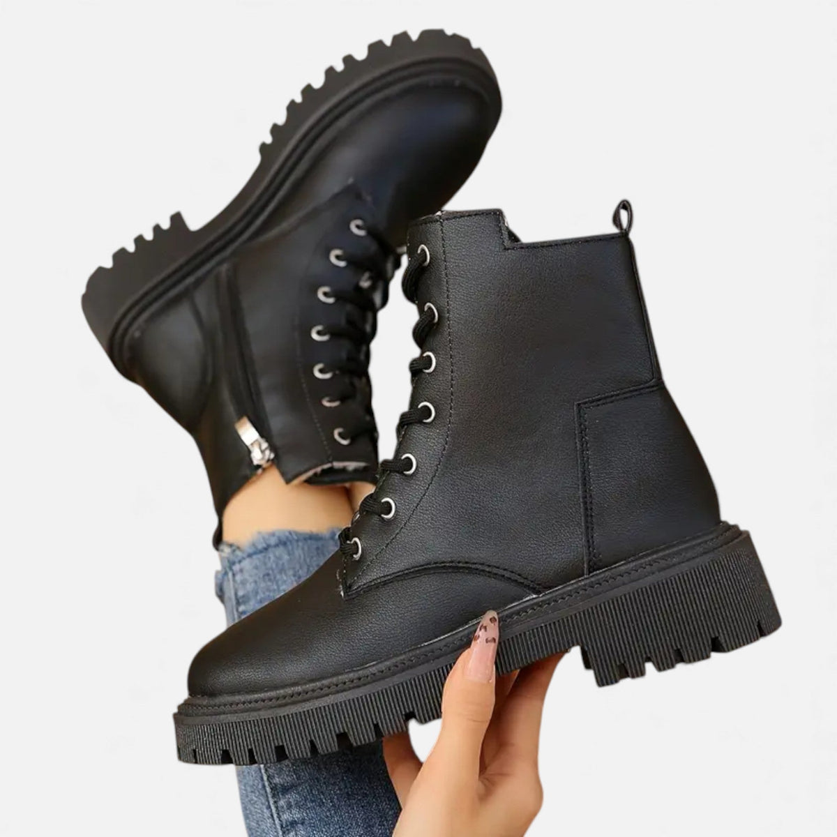 Women's lace-up ankle boots with side zipper, round toe, and thick patterned rubber sole