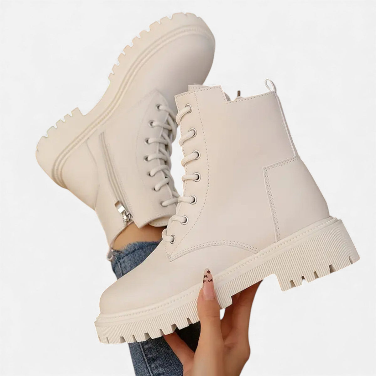 Women's lace-up ankle boots with side zipper closure and structured round-toe silhouette