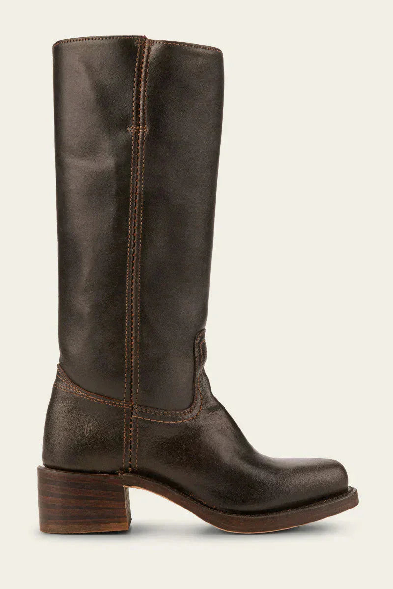Women's tall faux leather pull-on boots paired with autumn/winter styling