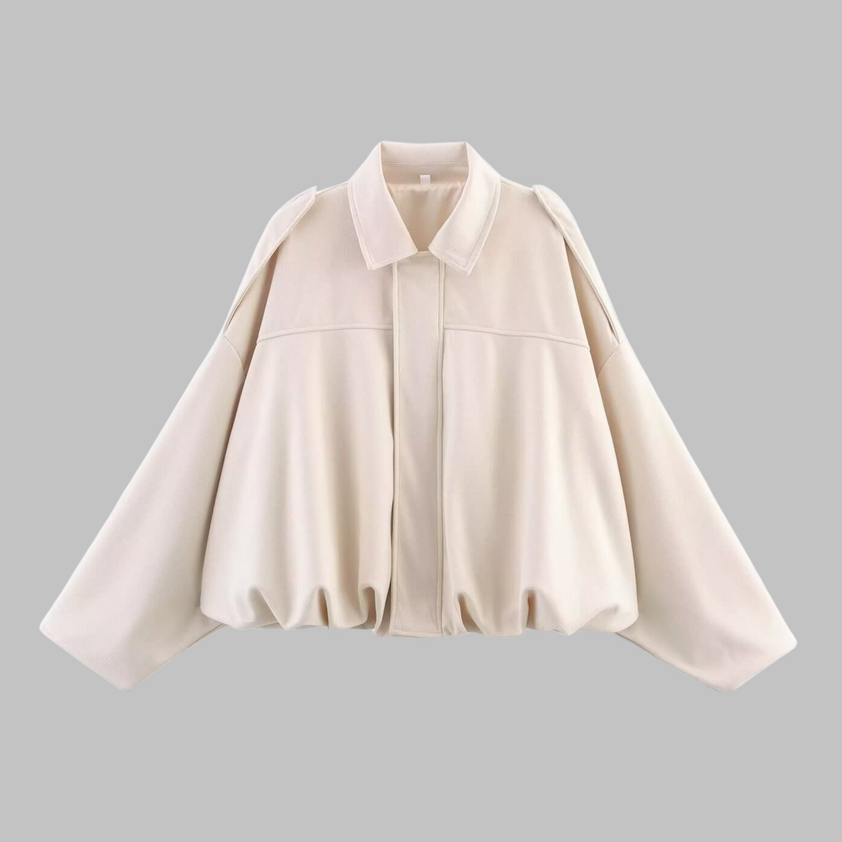 Women's cropped jacket with voluminous sleeves and a minimalist silhouette