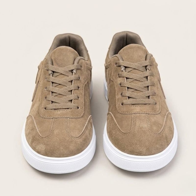 Men's casual lace-up sneakers with structured suede upper and perforated panel accents