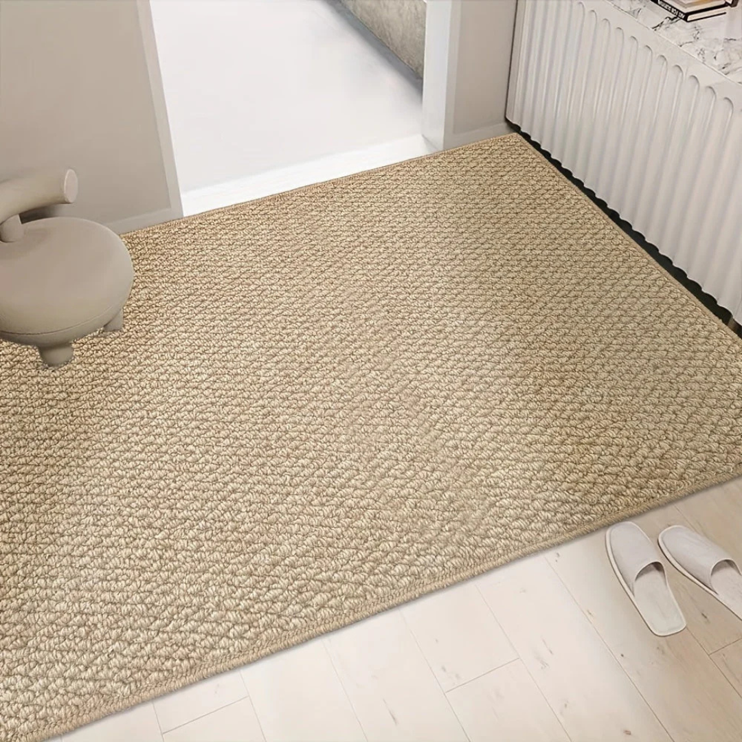 Tapis rectangulaire tissé posé au sol dans un espace intérieur