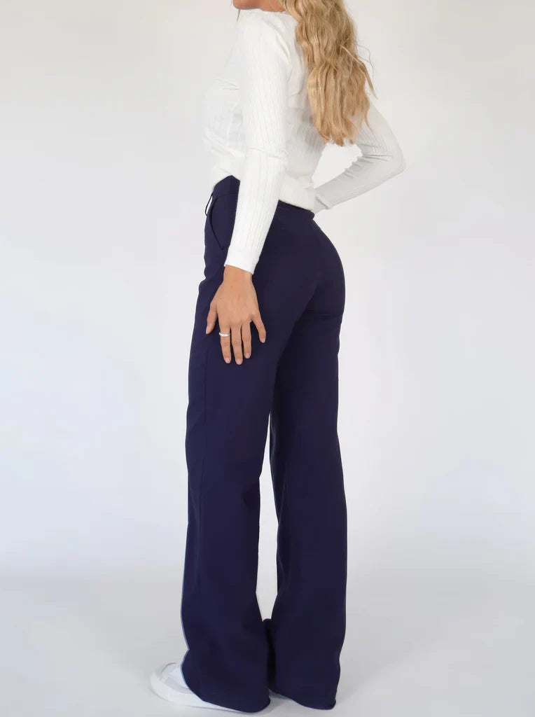 Pantalon large taille haute, coupe ajustée aux hanches, jambes fluides, femme