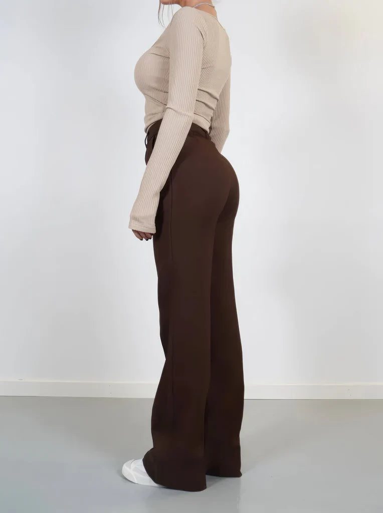 Pantalon taille haute à jambes larges, finition nette et tombé souple, femme