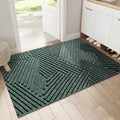 Tapis d’entrée vert avec motif géométrique texturé