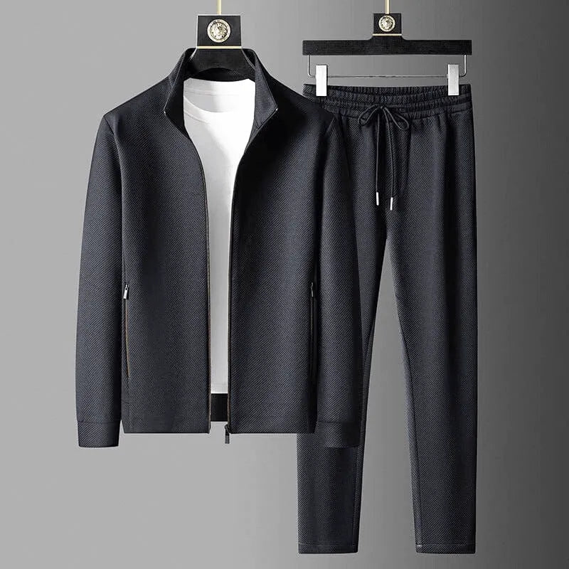 Men's zip-up training jacket and matching joggers – front detail showing zipper closure and fit