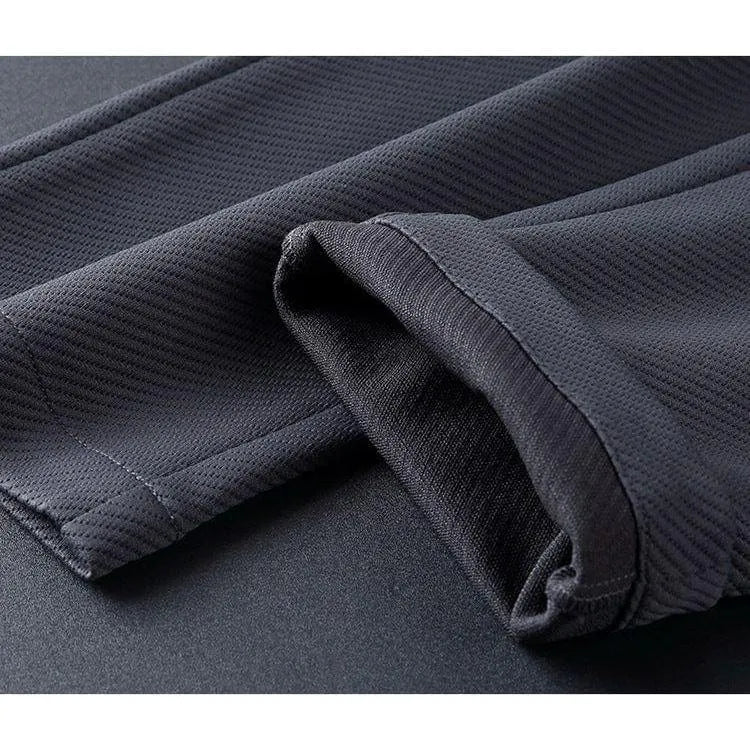 Men's training set jacket and joggers – back view showing clean seam construction and fit