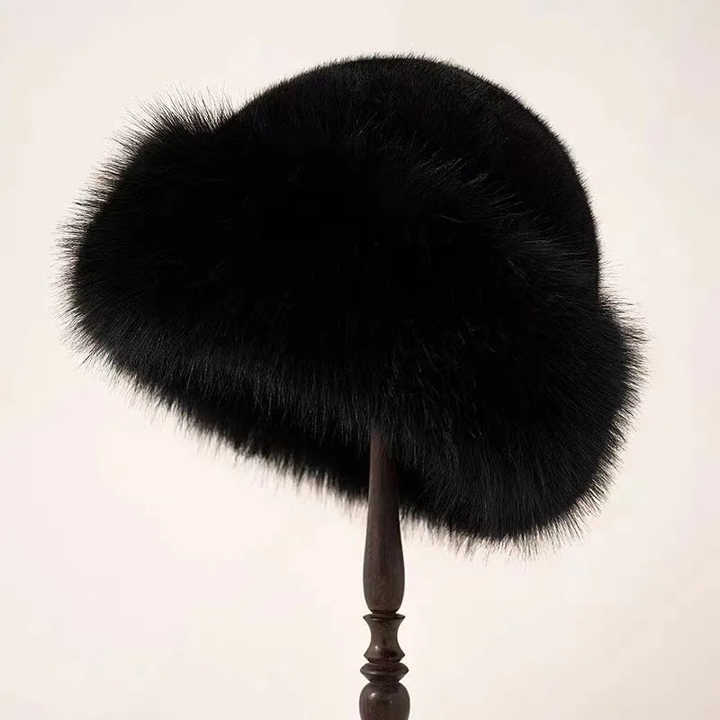 Women's faux fur winter hat styled on a model, casual winter wear look