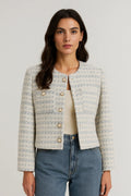 Veste courte en tweed texturé, col rond, boutons métalliques, coupe structurée femme